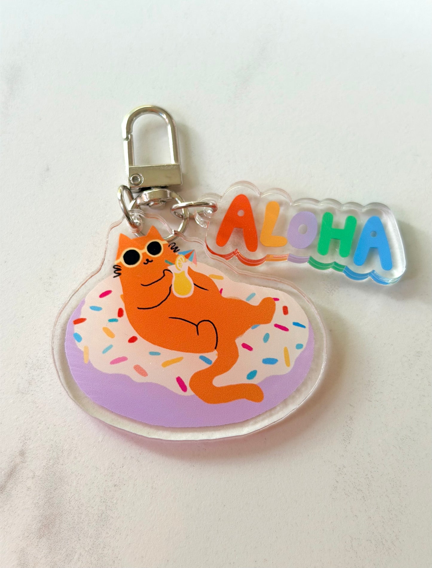 “Just Donut Care” Keychain – Milo the Beach Cat Collection