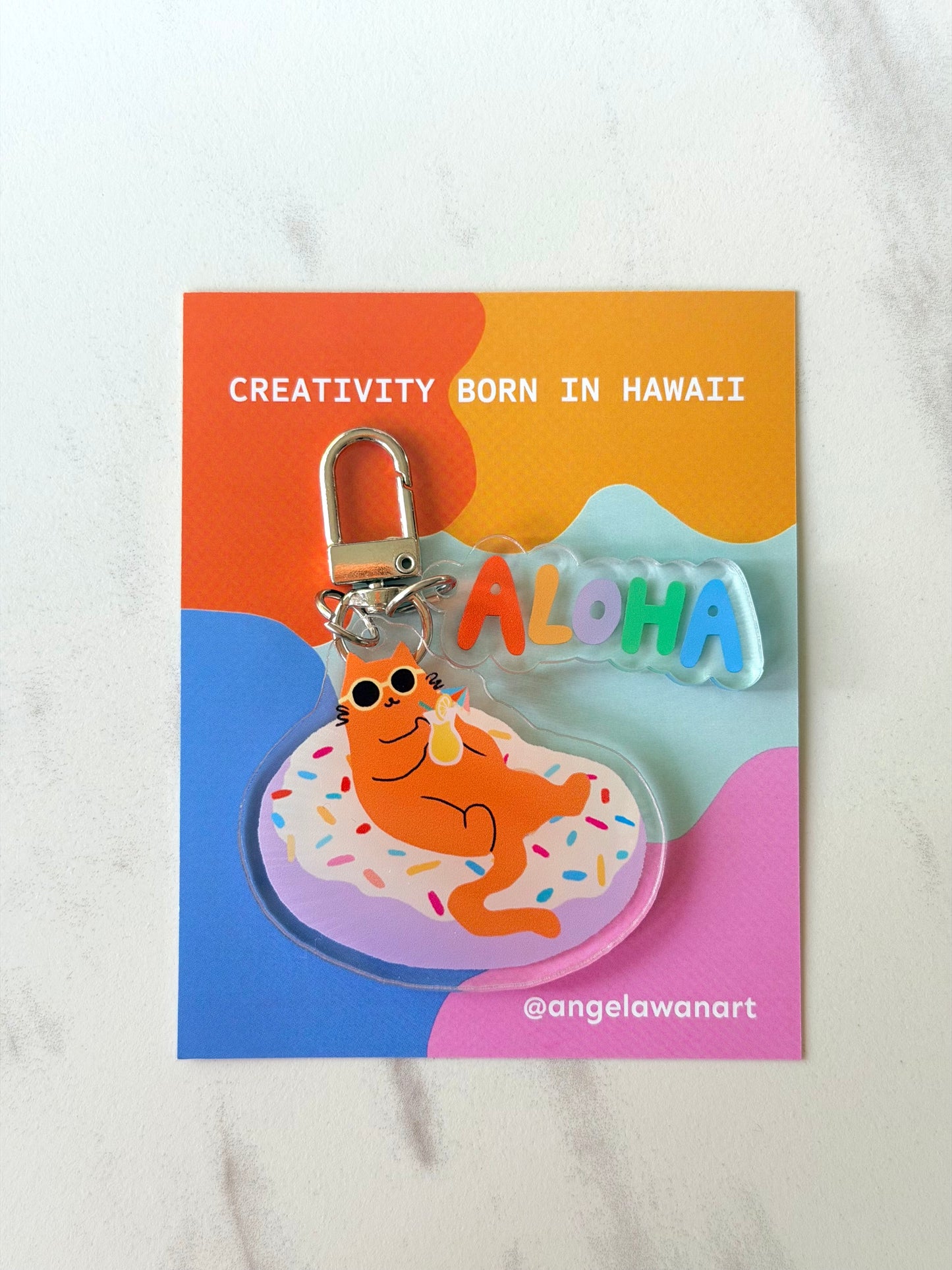 “Just Donut Care” Keychain – Milo the Beach Cat Collection